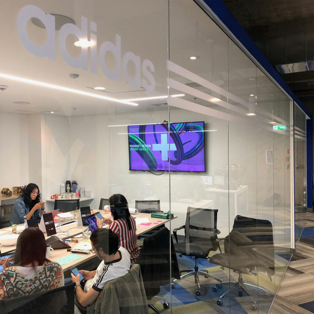meeting room with adidas brand